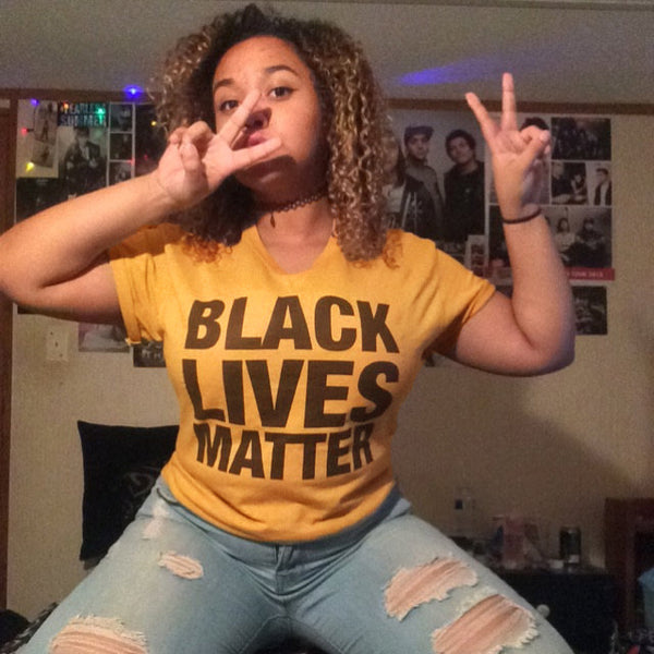 Black Lives Matter Women's Dark Yellow T-Shirt on Model