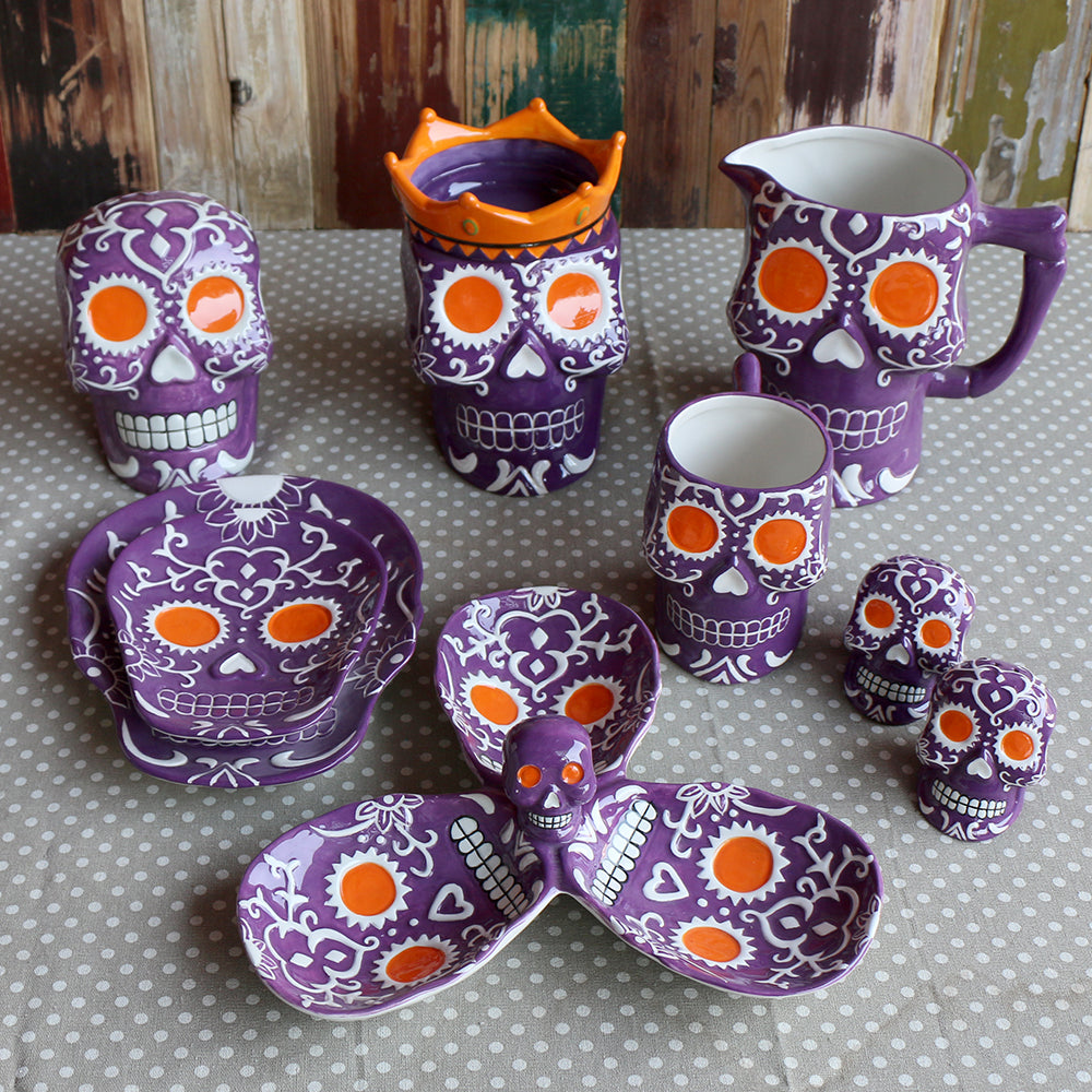 https://bokettobox.com/cdn/shop/products/sugar-skull-ceramic-painted-kitchen-variety-set-purple_1024x1024.jpg?v=1509916227