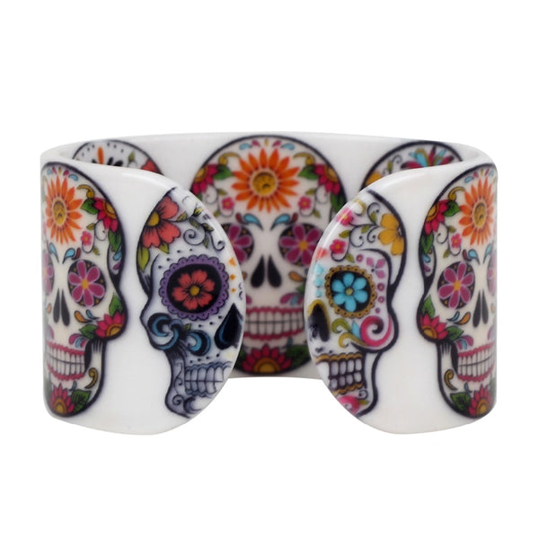 white cuff bracelet with colorful sugar skulls